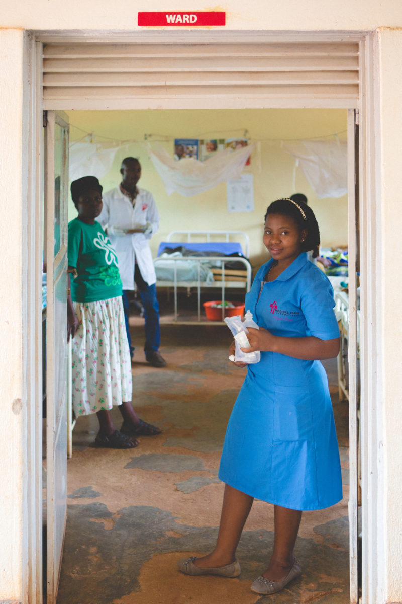 Ivan Lebed and Cathi Row, two Medical Teams staff members, standing in a hospital ward in Cambia 