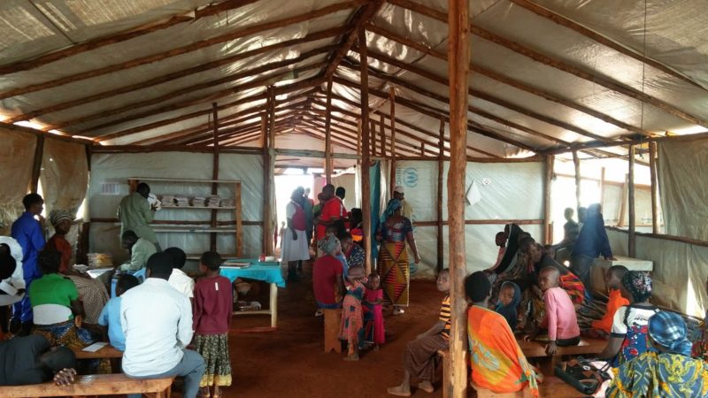 A health clinic in Nyarugusu Camp filled with people in need of medical care