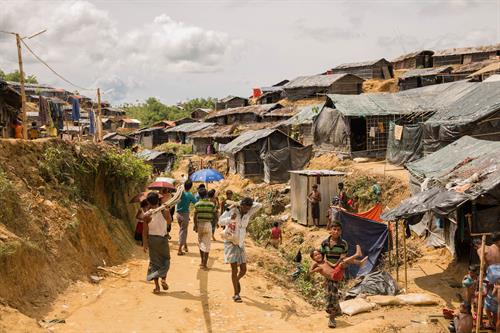 Refugees mill about in the Kutupolang Refugee Camp, among the fastest growing settlements in the world