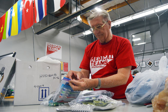 A faithful volunteers pack Hygiene Kits after Hurricane Harvey