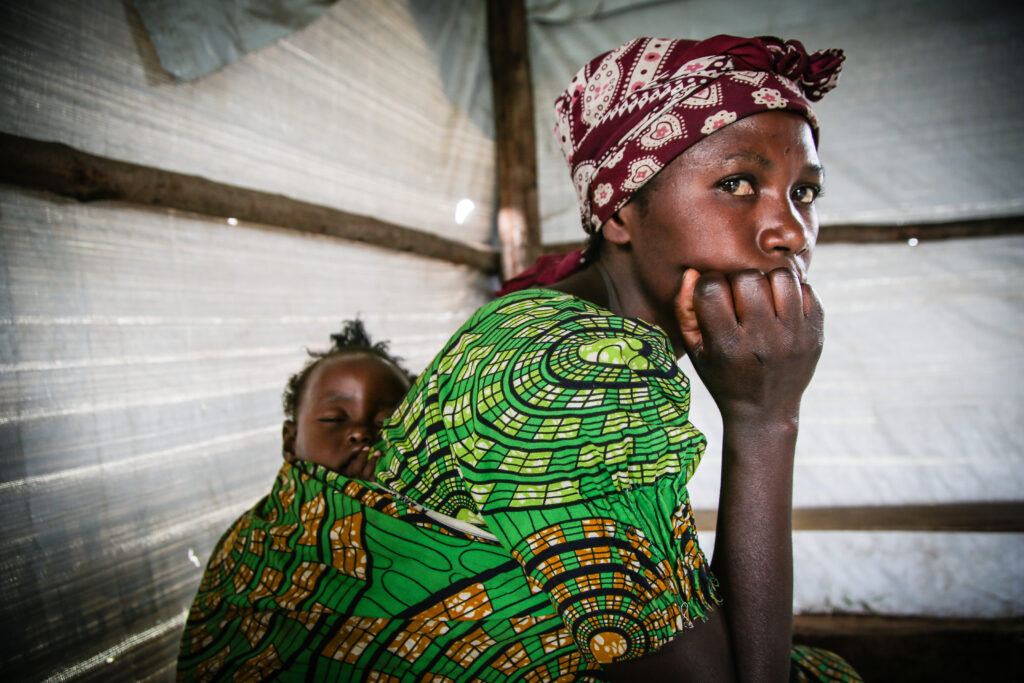 In Uganda, the DRC response program serves refugees like mother Manashimwe and her daughter Adele, 2018.