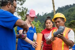 Volunteers from Providence St. Joseph Health and Medical Teams International staff construct clean water systems in rural Guatemala