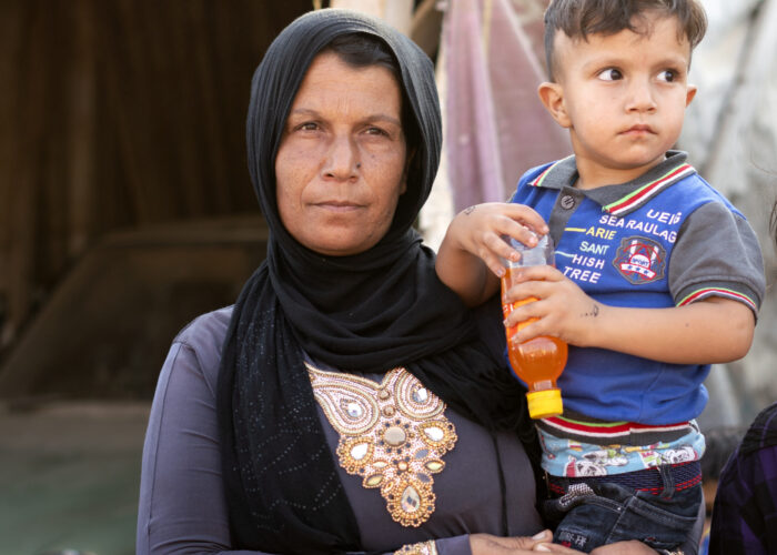A Syrian mother and son in a Lebanese refugee camp
