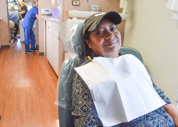 Gristina receives critical care at a mobile dental clinic.