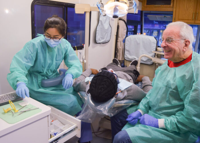 Volunteers, dentists and hygienists, provide free dental care in the U.S