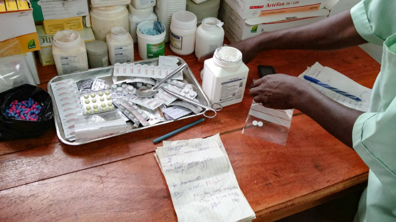 A table filled with donated medical supplies and medicines at Mtendeli refugee camp in Tanzania