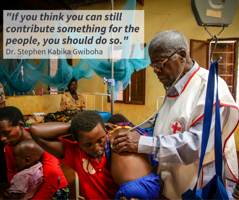 Dr. Stephen Kabika Gwiboha listening to the lungs of a boy suffering from malaria and pneumonia in a Tanzanian refugee camp