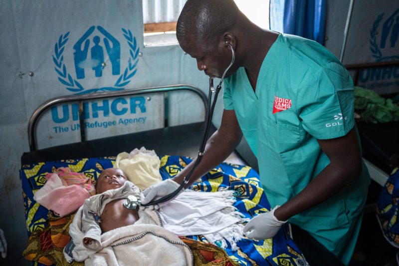 Uganda, treating a baby - Kyangwali, 2019.