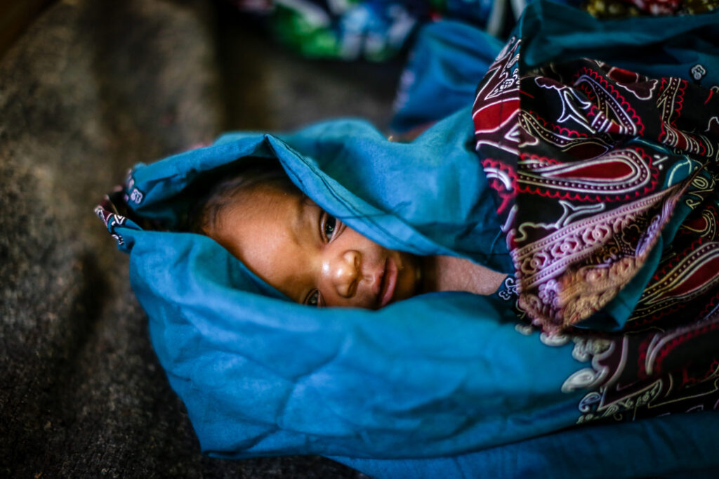 A newborn baby wrapped in cloth