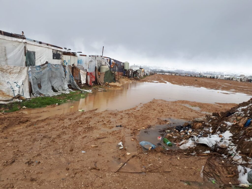 flooded refugee camp