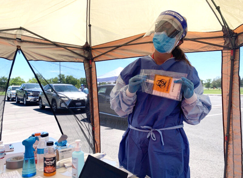 Carmen Miller at a COVID-19 Testing Clinic in Full PPE