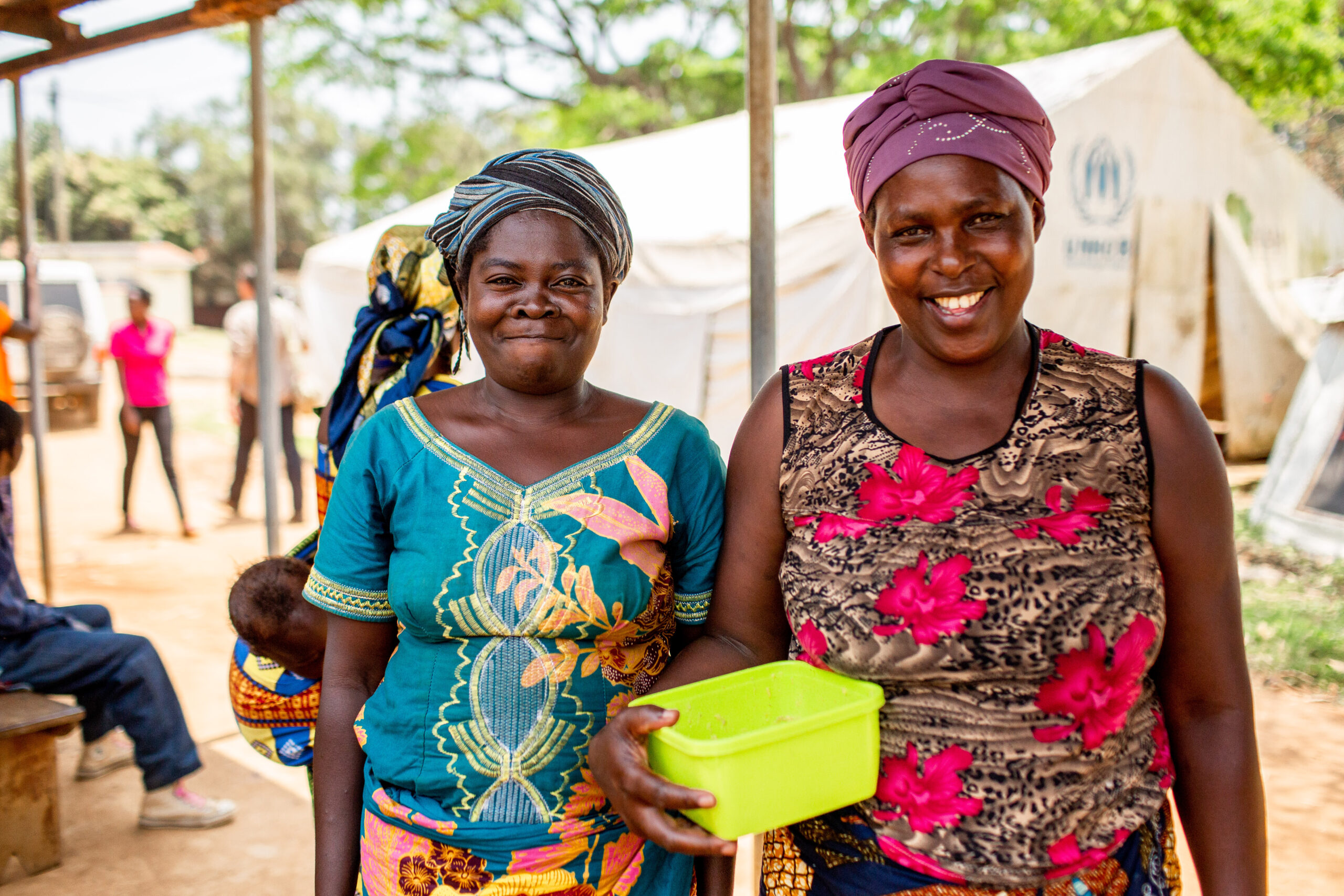 Women waiting outside the maternal and child health ward in Kyangwali, Uganda