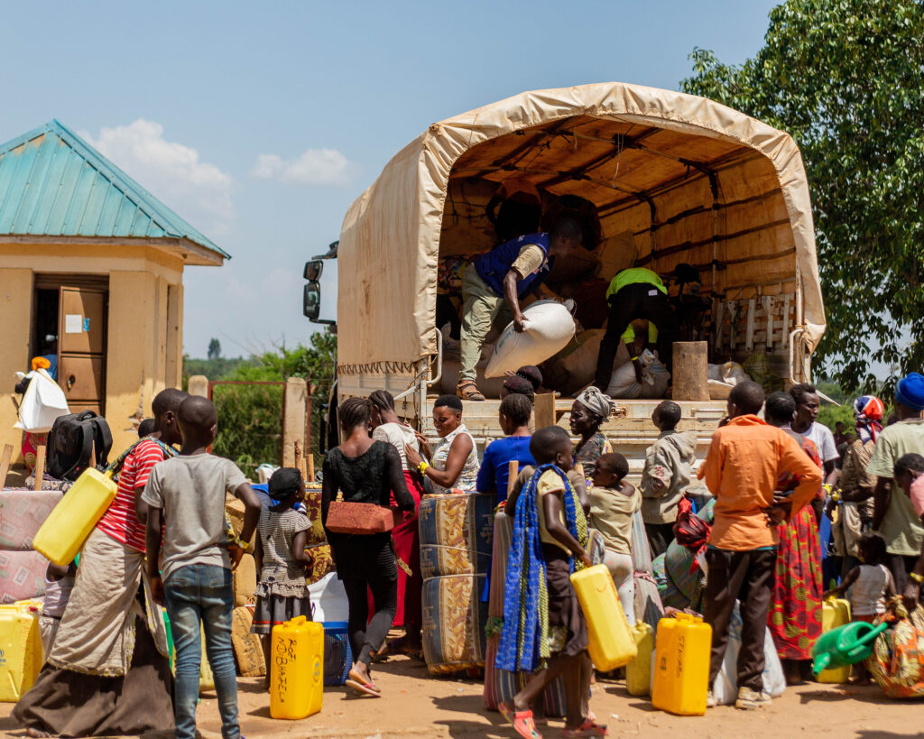 Refugees arriving to the transit center from the DR Congo