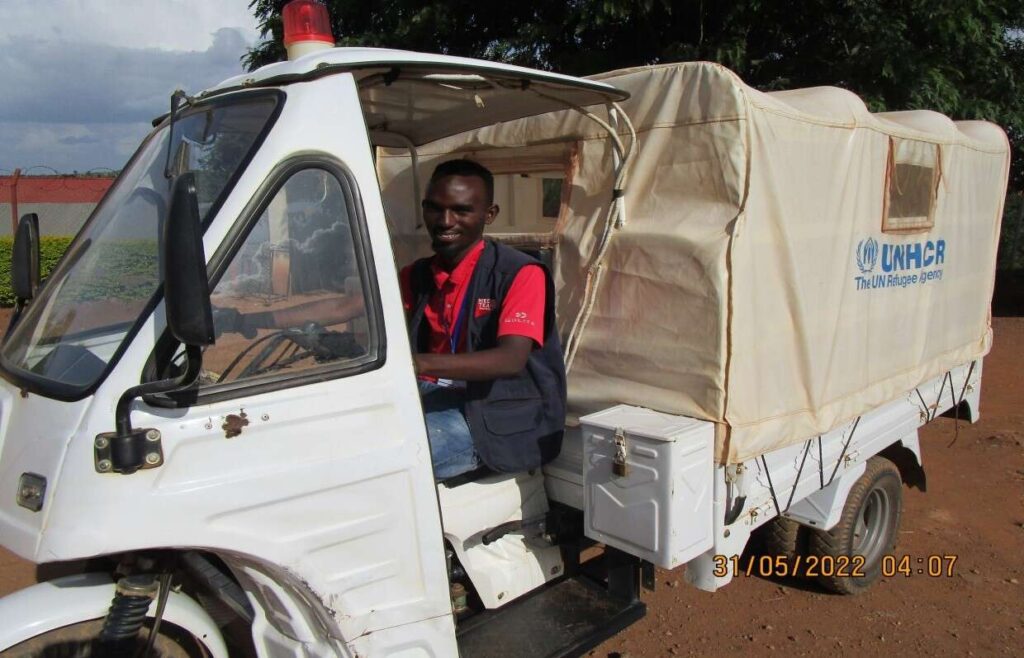 man driving tricycle ambulance