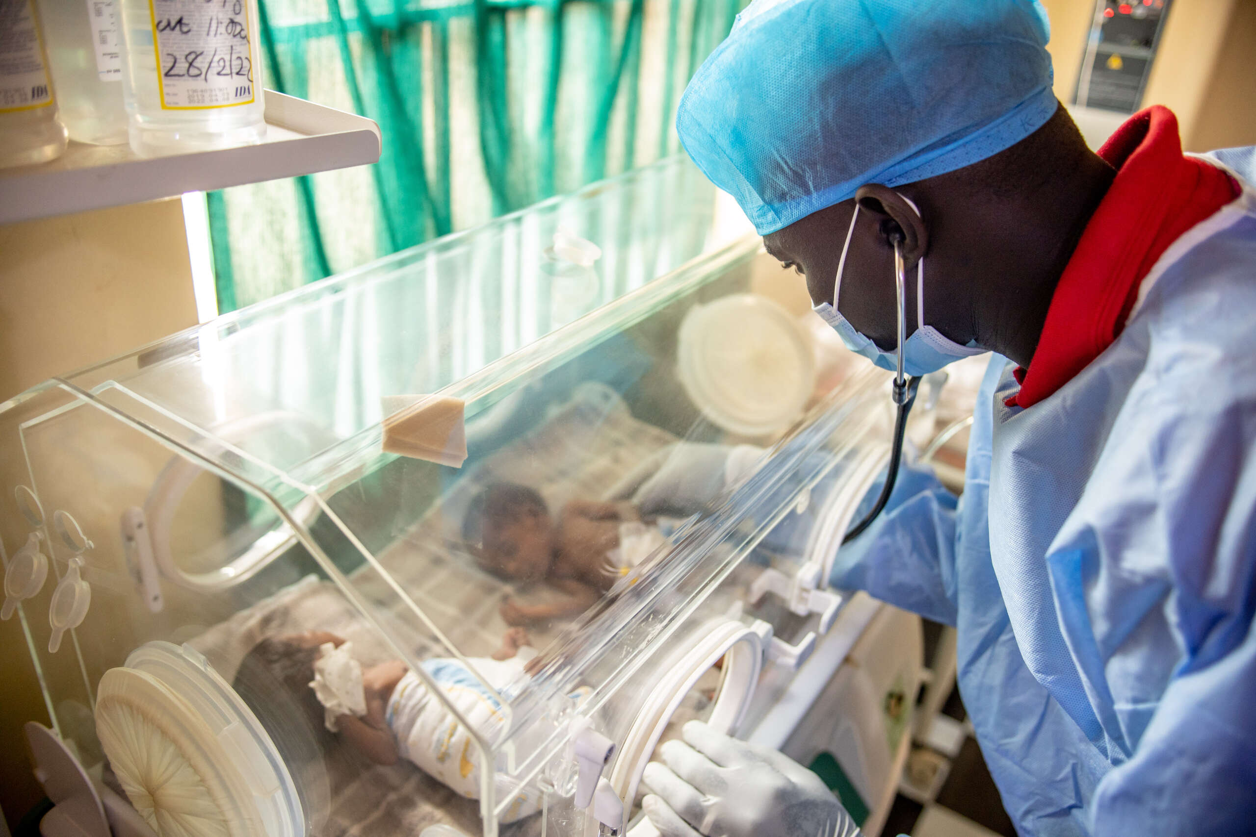 Uganda, Dr. Raphael checks on baby in the NICU in Rwamwanja, 2022