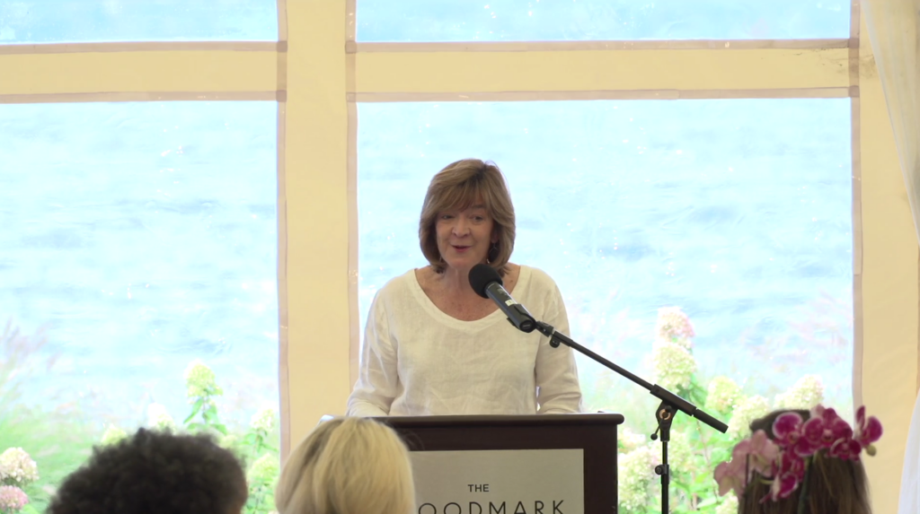 Martha Holley Newsome at a podium speaking