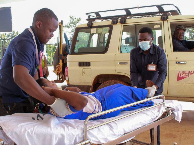 Emergency patient on stretcher with Medical Teams.