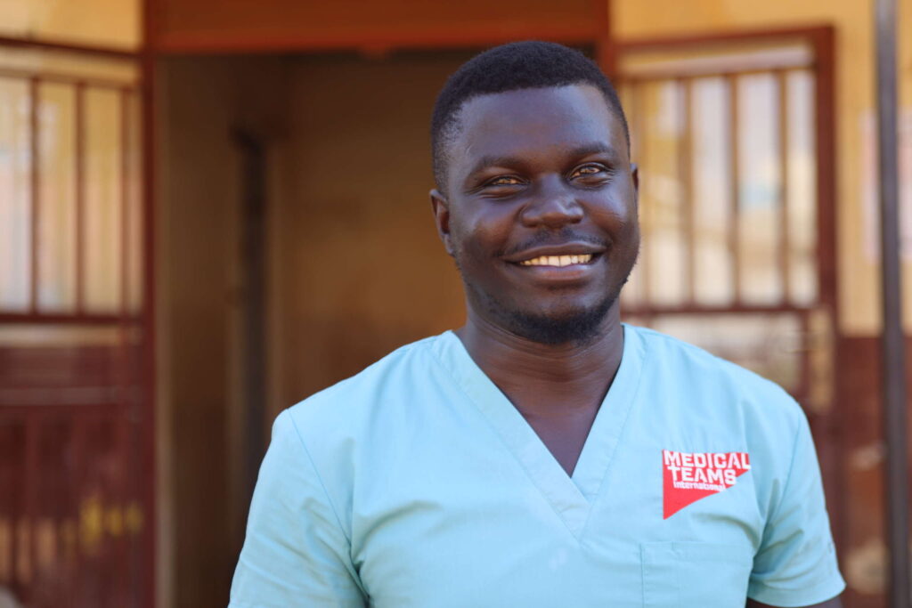 a nurse smiles at the camera in uganda, one of the 7 countries Medical Teams serves in