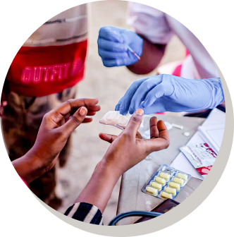 A patient receives care at a mobile medical setup in our refugee camp in response to fighting in Sudan