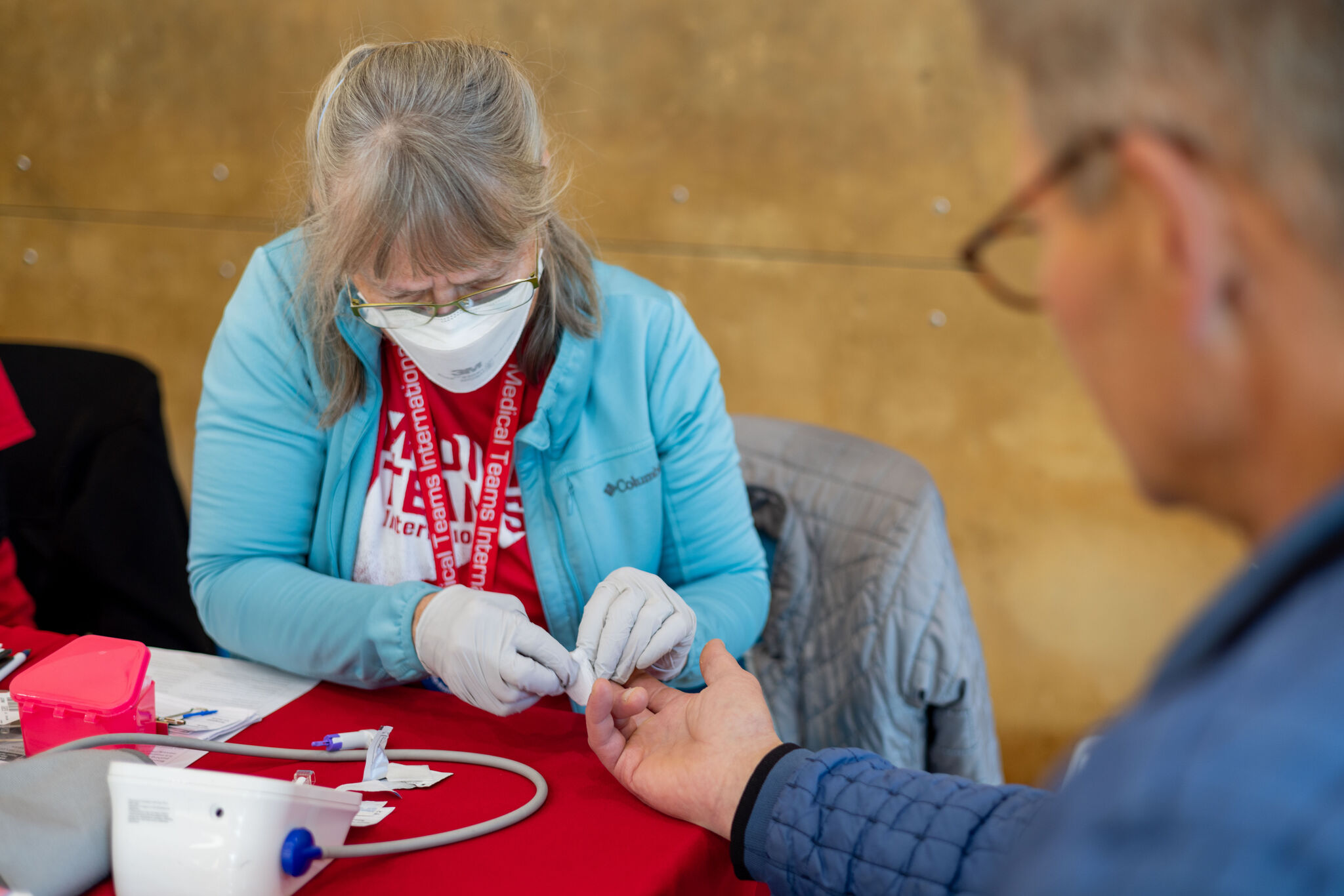 Nurse Bess, volunteers to administer diabetes tests to patients with Medical Teams in the U.S.