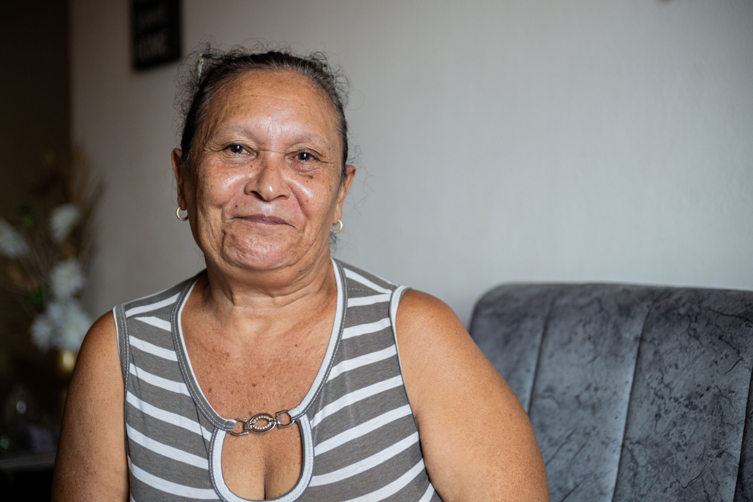 Morelba Franco smiling in her home.