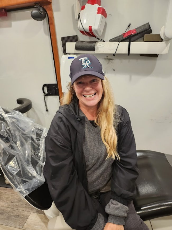 Care & Connect dental patient Elizabeth Stafford smiles after receiving care for her cracked tooth. 