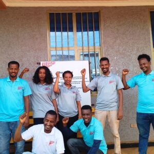 Medical Teams staff members in the accelerate action pose for International Women's Day