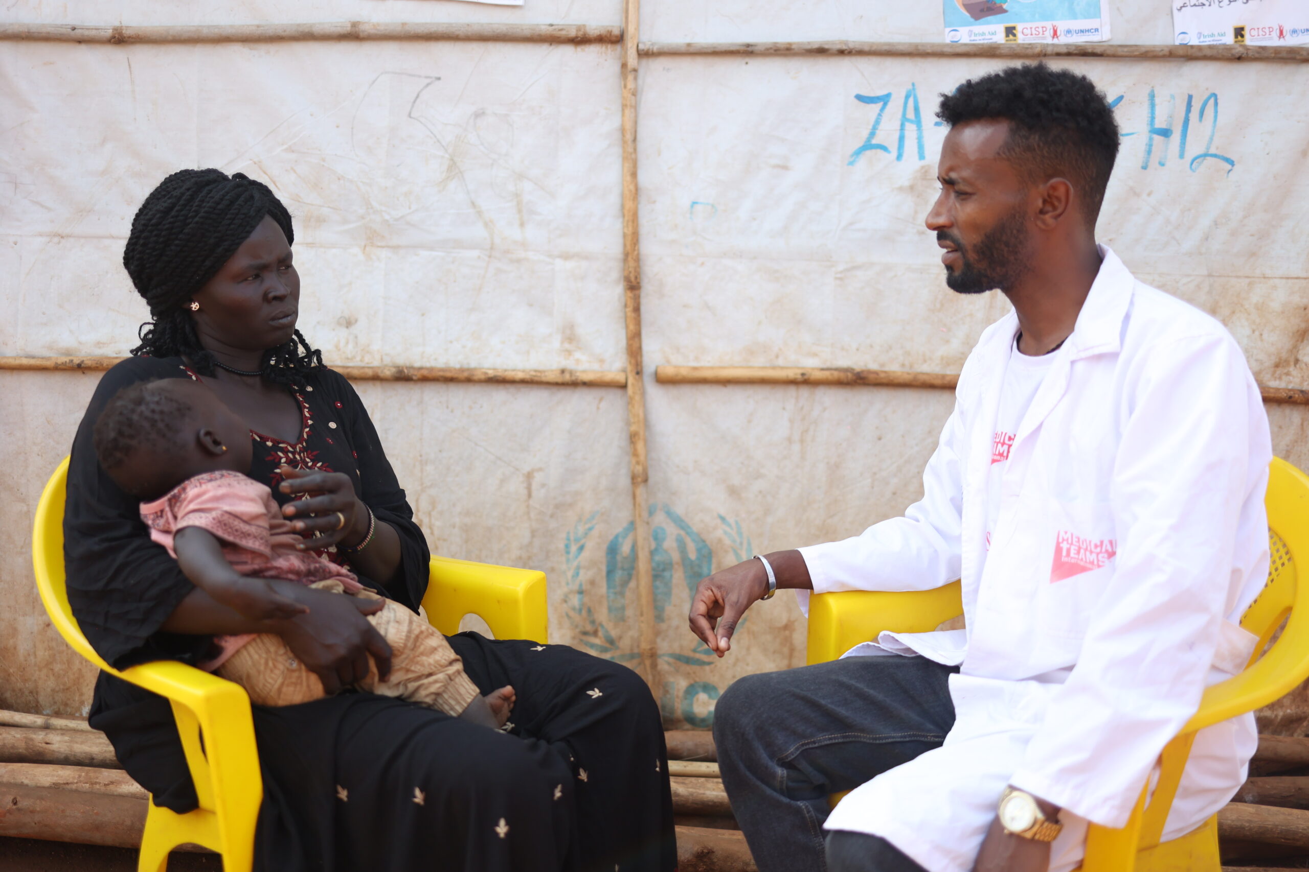 Kinana and her child at a health consultation. 