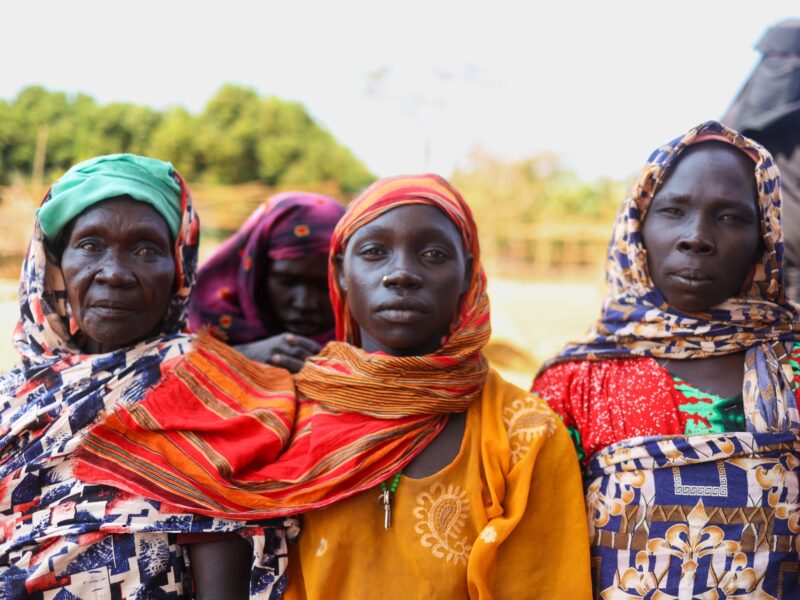 A group of women stand outside in Ethiopia