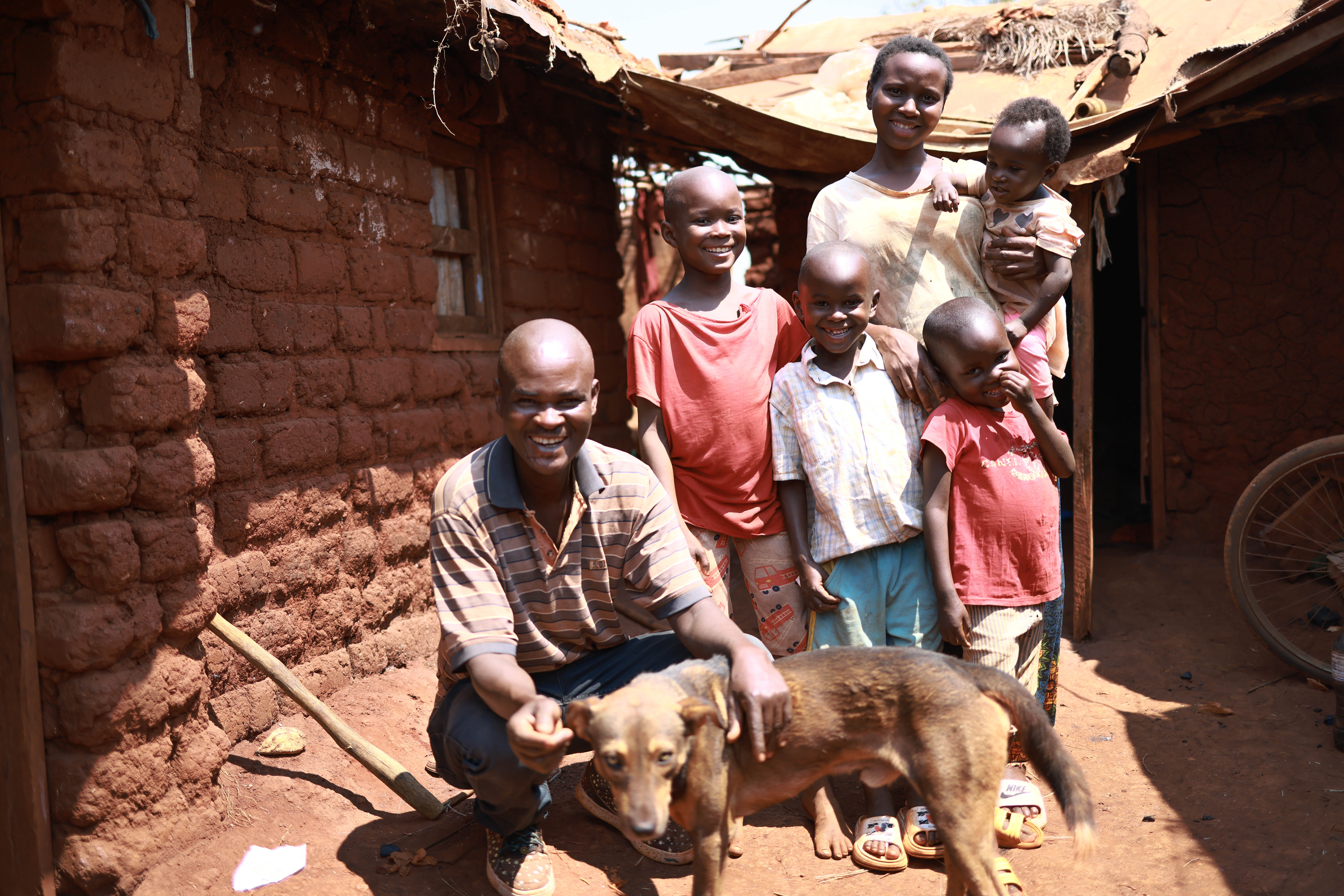 Reuben with his family and their dog.