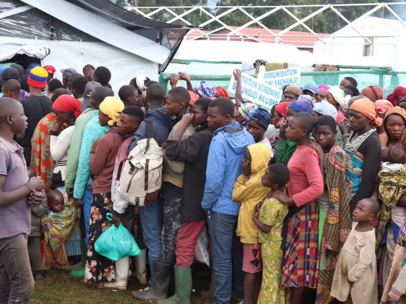 Uganda, new arrivals outside Medical Teams Clinic, 2022