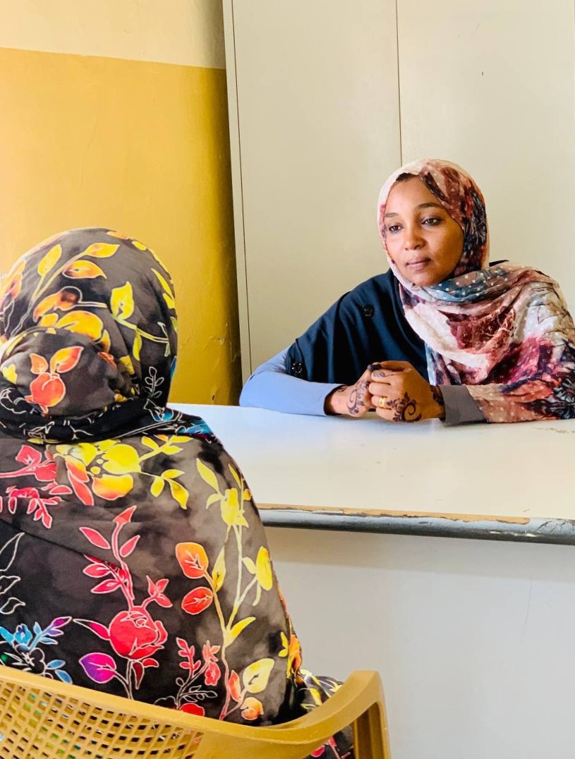 Asma during a consultation with a patient.