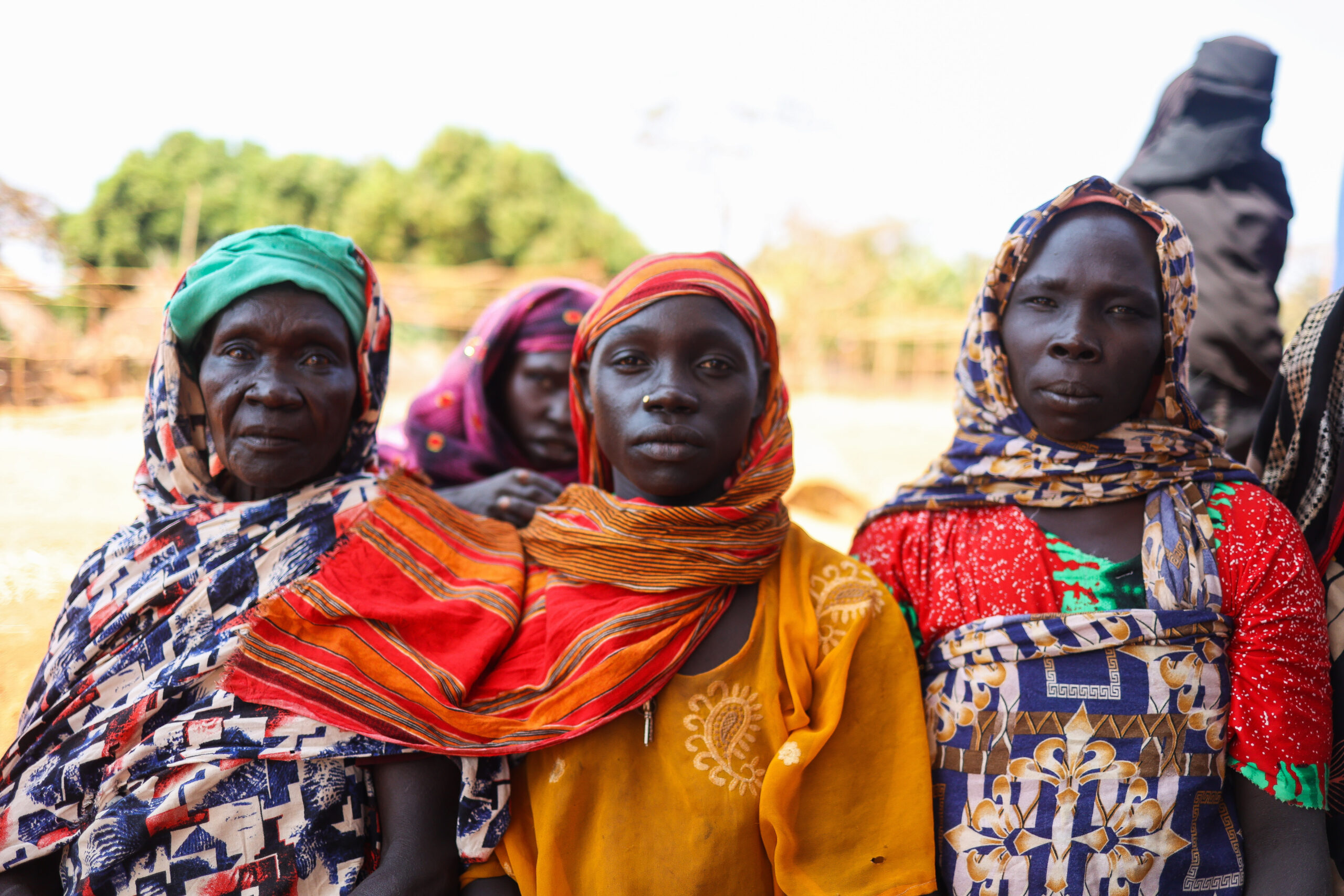 Portrait of Ethiopian women sitting outside of clinic's maternal ward. 