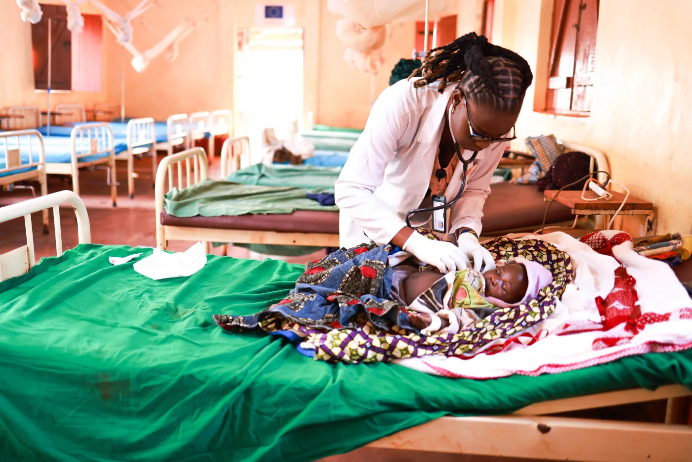Dr. Jane Gervas with patient at clinic in Tanzania