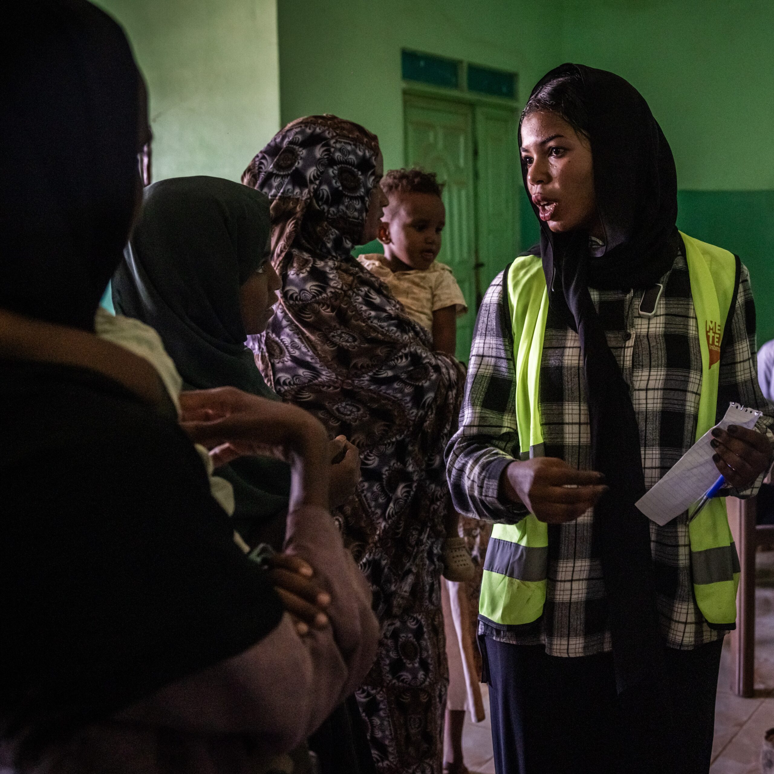 Health care workers deliver support to the patients and beneficiaries at an MTI mobile clinic in Khartoum.