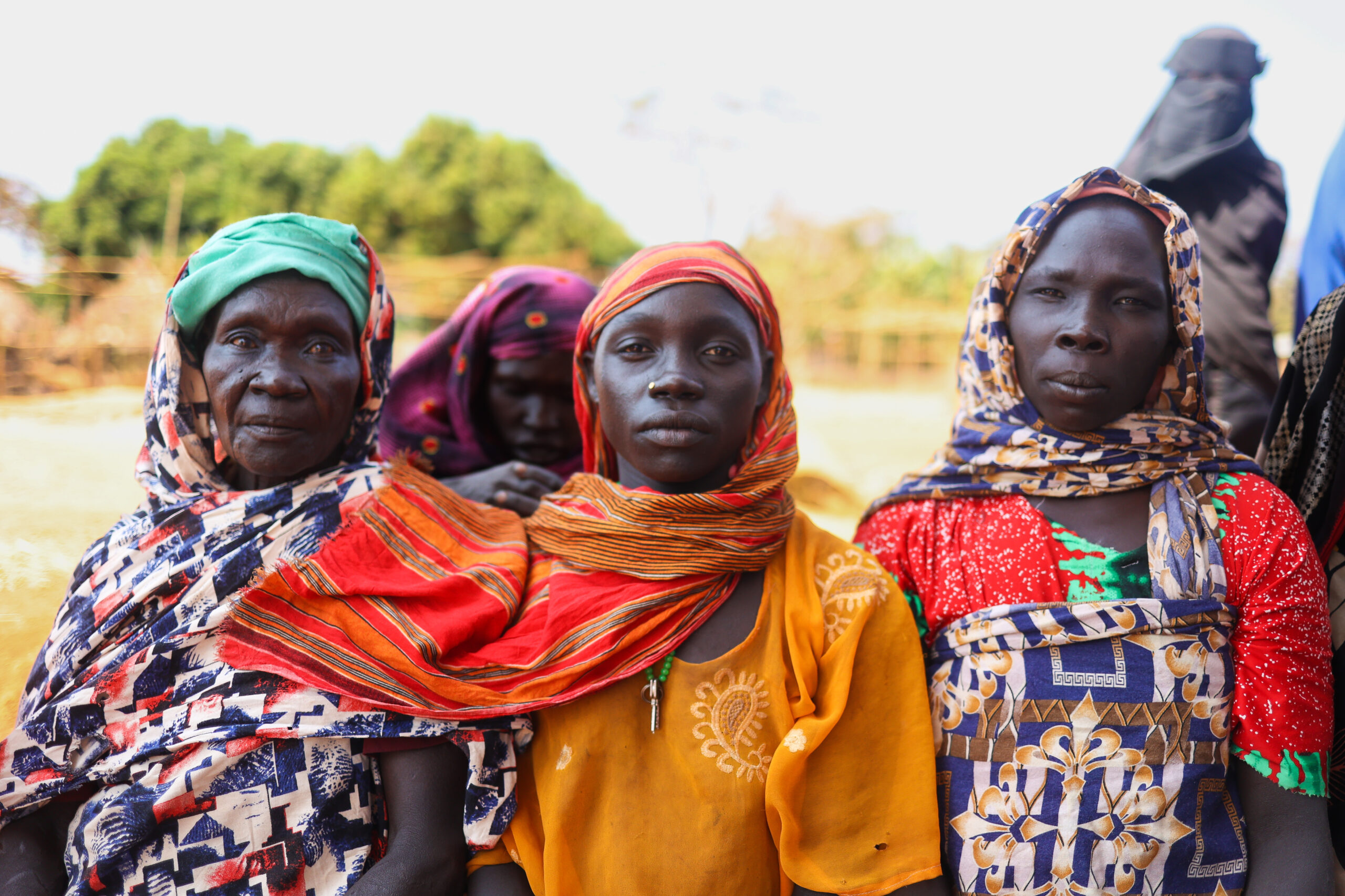 Portrait of women sitting outside of a clinic's maternity ward in Ethiopia