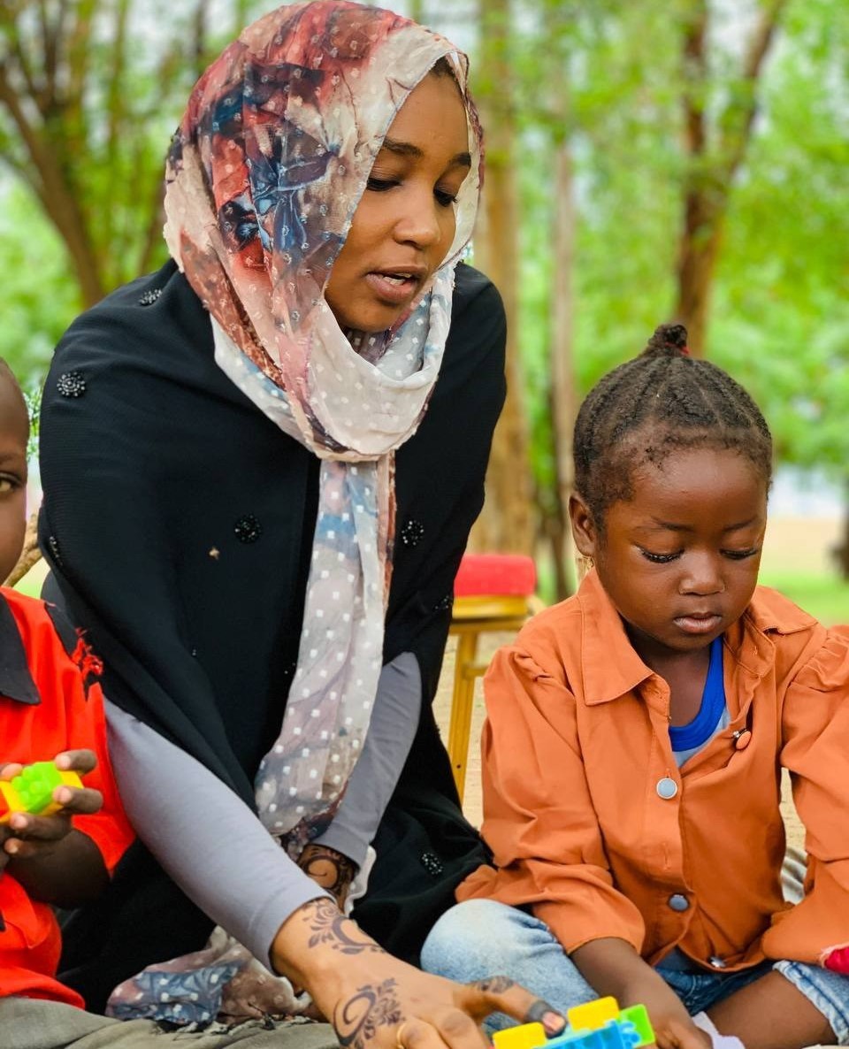 Asma, a clinical psychologist with Medical Teams facilitates a play therapy session with local children in Al Jazirah, Sudan. Our Mental Health and Psychosocial Support teams were able to provide mental health support to over 191,000 people in Sudan this past year.