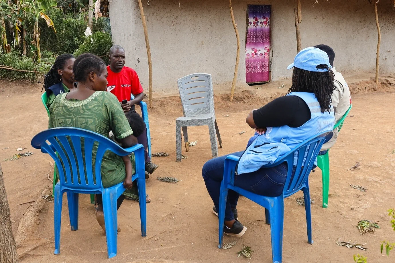 Kimanuka visits a patient in his community