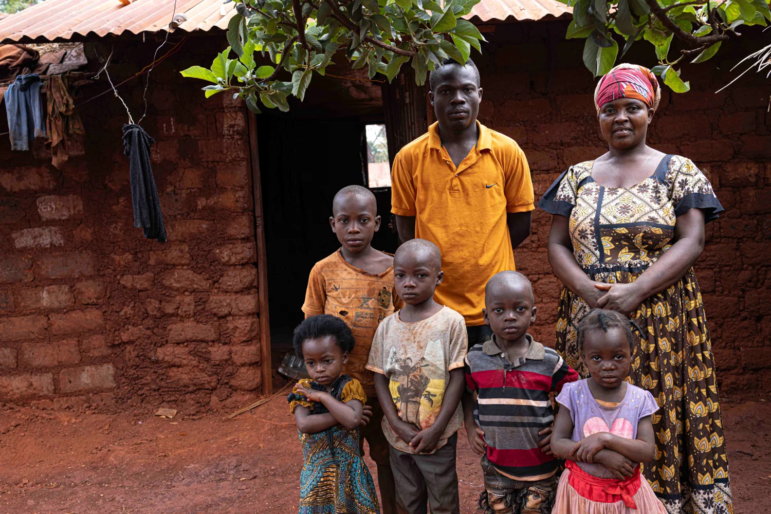 Bacumi with son and grandchildren in Tanzania.