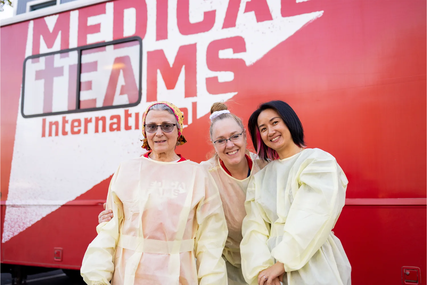 Jill Ewanchuk with volunteer dentists Dr. Susan Rustvold and Dr. Huang Jing at the IRCO clinic in the USA.